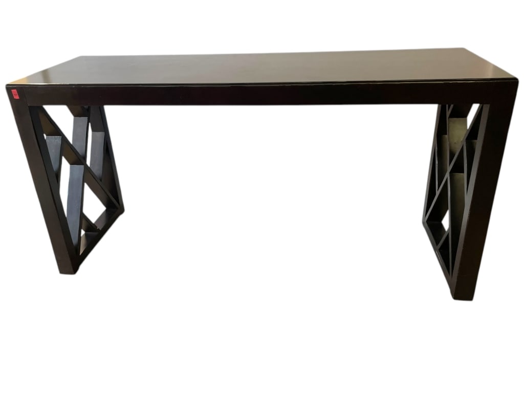 MODERN BLACK CONSOLE TABLE 64": MODERN BLACK CONSOLE TABLE FEATURING A SLEEK RECTANGULAR TOP AND DISTINCTIVE GEOMETRIC BASES WITH ANGLED CROSS-BRACING FOR VISUAL INTEREST. THE HIGH-GLOSS BLACK FINISH OFFERS A CONTEMPORARY LOOK THAT