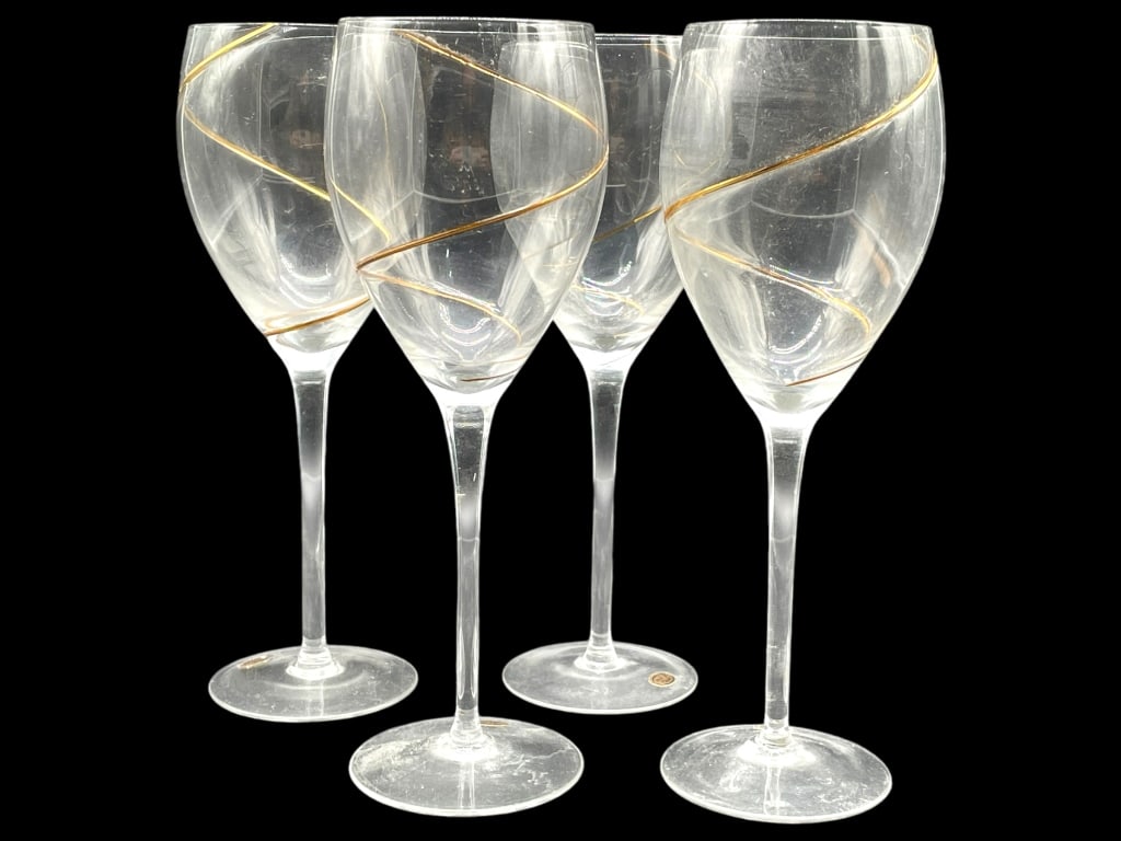 GOLD SWIRL WINE GLASSES SET OF 4: GOLD SWIRL WINE GLASSES SET OF 4 -VERY GOOD PRE OWNED CONDITION -SET OF 4 -APPROX 9" -JA 010325 #9 ***Please note that due to limited storage space, all items must be picked up within 14 days of the a