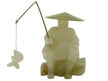 CARVED STONE FIGURE OF A FISHERMAN 4"