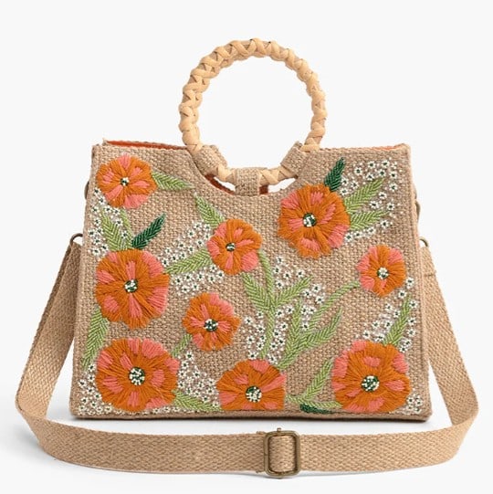 NEW! AMERICA AND BEYOND FLORAL BEADED TOTE: Luxe Embellished shoulder bag Embellishments all-over in floral patterns Detachable shoulder straps, round cane handles Magnetic Button closure Lined interiors with zip pocket