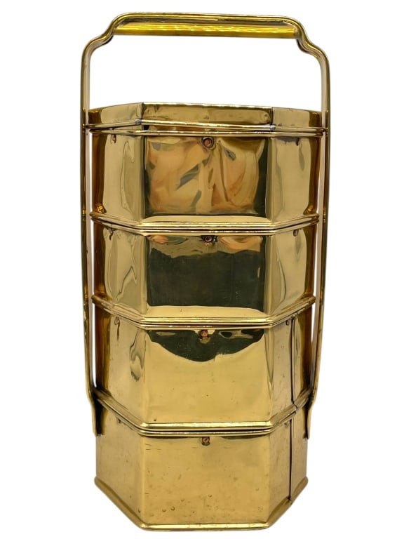 VINTAGE ASIAN BRASS TIFFIN CARRIER 16": VINTAGE ASIAN BRASS TIFFIN CARRIER 16" -VERY GOOD PRE OWNED CONDITION -APPROX 16" X 8" -FOUR-TIER STACKING HEXAGONAL CONTAINERS WITH SECURE HANDLE AND LATCH SYSTEM. POLISHED BRASS WITH CLASSIC FORM, I