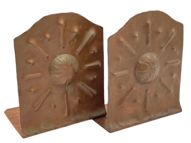 PAIR OF HAND WROUGHT COPPER SUNBURST BOOKENDS