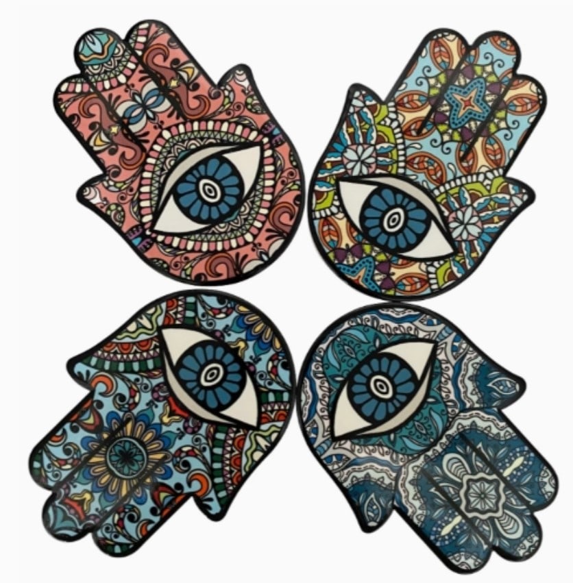 NEW EVIL EYE CERAMIC COASTER TRIVET SET: The combination of the Hamsa Hand & Evil Eye offers a formidable and powerful symbol of protection. With the fingers pointing upwards, the Hamsa Hand offers benevolence and protection. The accompanyin