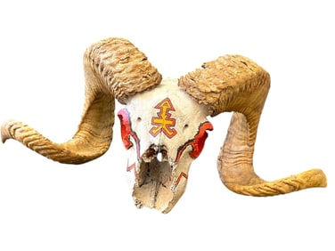 PAINTED RAM SKULL WITH LARGE CURLING HORNS