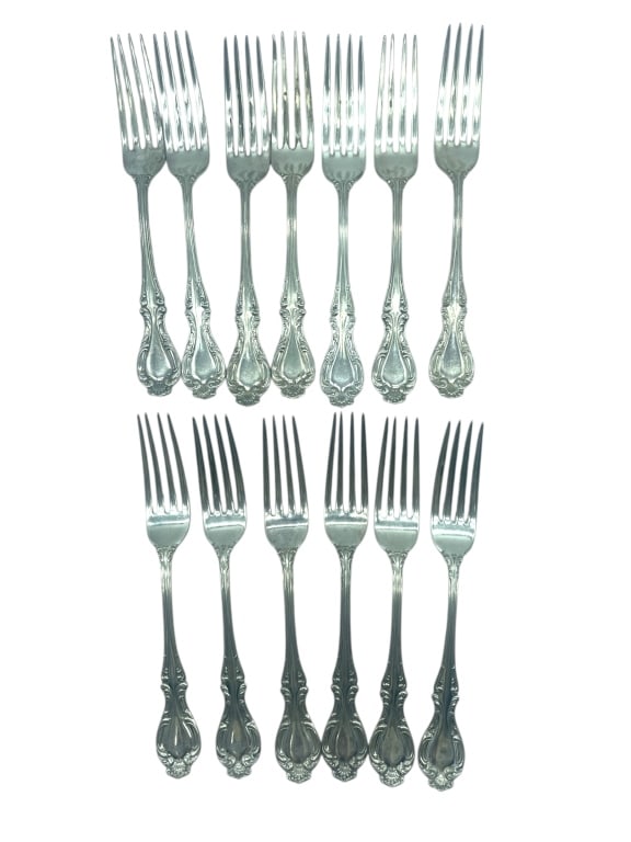 SET OF 13 ANTIQUE SILVERPLATE DINNER FORKS: SET OF 13 ANTIQUE SILVERPLATE DINNER FORKS - ALL FORKS IN GOOD PRE-OWNED CONDITION WITH MINOR WEAR AND LIGHT TARNISH CONSISTENT WITH AGE. - MATCHING PATTERN WITH ORNATE SCROLLWORK HANDLES, POSSIBLY VI