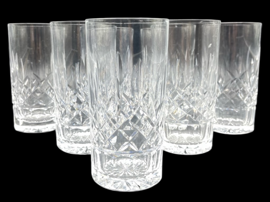 7 WATERFORD-STYLE CUT CRYSTAL HIGHBALL GLASSES: SET OF 7 WATERFORD-STYLE CUT CRYSTAL HIGHBALL GLASSES - GREAT PRE-OWNED CONDITION; WITH EXCEPTION TO SMALL CHIP ON RIM OF ONE GLASS - SEE PHOTO - 5.75" H; 2.75" DIAMETER APPROX - CLASSIC DESIGN FEATUR