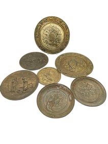 LOT OF SEVEN VINTAGE EMBOSSED BRASS WALL PLAQUES