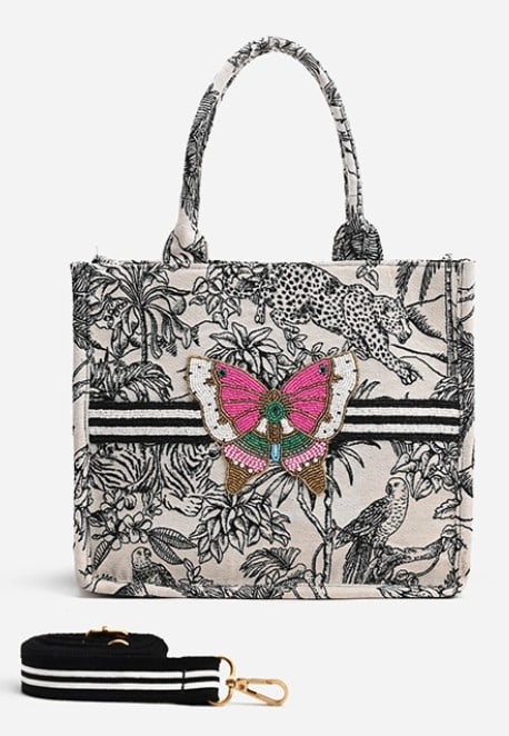 NEW! AMERICA & BEYOND FORBIDDEN TOTE: NEW! AMERICA & BEYOND FORBIDDEN TOTE -Medium Sized Book Tote, Hand Embellished Beadwork in Front, Beaded Butterfly in front, Double shoulder straps, Long Adjustable Strap, Magnetic button closure, mad