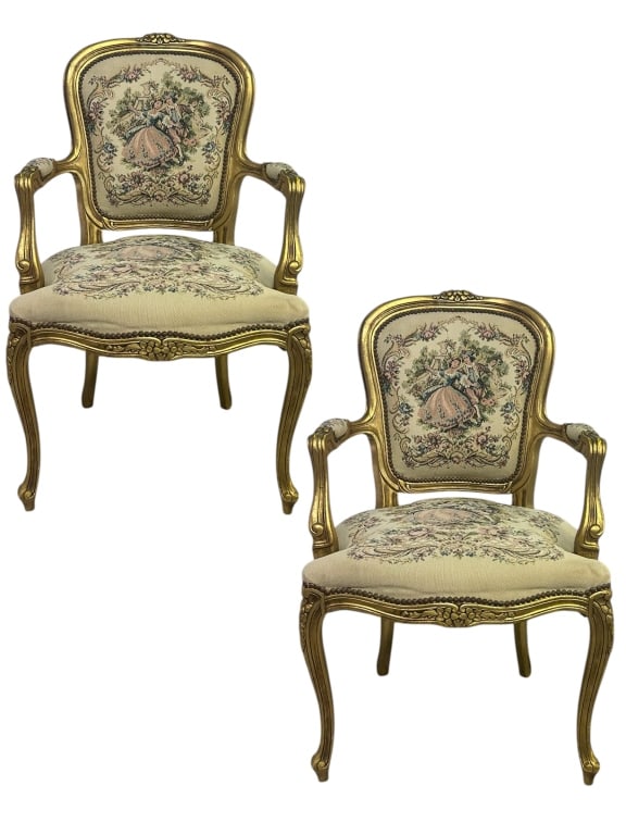 PAIR OF FRENCH LOUIS XV STYLE ARMCHAIRS 38": - ELEGANT AND ORNATE, THIS MATCHED PAIR OF LOUIS XV STYLE FAUTEUIL ARMCHAIRS FEATURES CARVED AND GILTWOOD FRAMES WITH SCROLLED ARMS, CABRIOLE LEGS, AND FLORAL CREST DETAILS. THE SEATS AND BACKS ARE BE