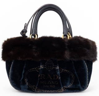 PRADA RE-EDITION SHEARLING CANAPA TOTE: PRADA RE-EDITION SHEARLING CANAPA TOTE NAVY BLUE/BLACK STAMPATA VELVET CANVAS/FUR CANVAS GOLD -NAVY BLUE/BLACK -CANVAS -24*17*10CM -STRAP -CONDITION RATING AA -GTA0679 -LUXURIOUS PRADA TOP-HANDLE BAG