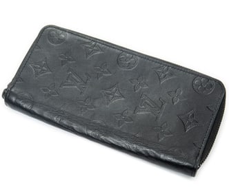 LOUIS VUITTON ZIPPY VERTICAL MONOGRAM WALLET