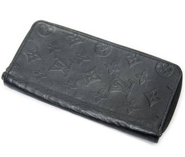 LOUIS VUITTON ZIPPY VERTICAL MONOGRAM WALLET: LOUIS VUITTON ZIPPY WALLET VERTICAL MONOGRAM SHADOW -BLACK -CALF LEATHER -10*20*2CM -CONDITION RATING A -ABA8044 -FEATURES INCLUDE A FULL ZIP-AROUND CLOSURE, MULTIPLE CARD SLOTS, BILL COMPARTMENTS, AN