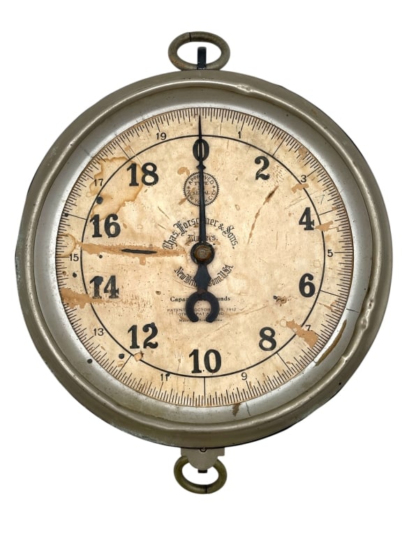 ANTIQUE HANGING SCALE 12": ANTIQUE HANGING SCALE 12" -VERY GOOD PRE OWNED CONDITION -APPROX 12" -DUAL HOOKS FOR HANGING AND WEIGHING. DISTINCTIVE AGE-RELATED PATINA AND RUST MARKS ADD TO ITS INDUSTRIAL CHARACTER. A CLASSIC EXAM