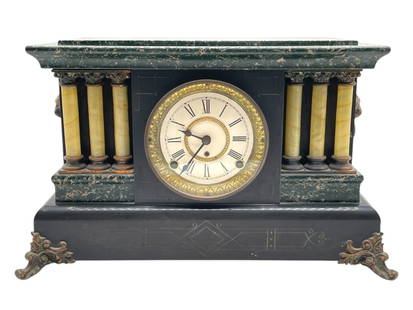 SETH THOMAS MARBLED MANTEL CLOCK 18": SETH THOMAS MARBLED MANTEL CLOCK 18" -VERY GOOD PRE OWNED CONDITION -APPROX 18" X 11" -FEATURES CREAMY CELLULOID COLUMNS, ORNATE CAST METAL FEET, AND A GILT-BORDERED CLOCK FACE WITH ROMAN NUMERALS -JA