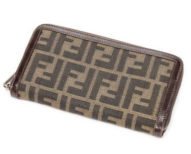 FENDI ZIP AROUND ZUCCA CANVAS WALLET: FENDI ZIP AROUND WALLET ZUCCA CANVAS -KHAKI/DARK BROWN -CANVAS -18.5*10*2CM -CONDITION RATING AB -ABA8946 -THIS CLASSIC FENDI WALLET FEATURES THE ICONIC BROWN ZUCCA MONOGRAM CANVAS WITH DARK BROWN LEA