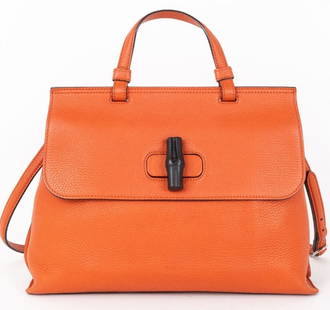 GUCCI MEDIUM BAMBOO DAILY TOP HANDLE HANDBAG: GUCCI MEDIUM BAMBOO DAILY TOP HANDLE ORANGE CALFSKIN GRAINED LEATHER SILVER -ORANGE -CALF LEATHER -33*24*13CM -STRAP -CONDITION RATING AA -GTA0655 -BOLD AND MODERN GUCCI TOP HANDLE BAG IN VIBRANT ORAN