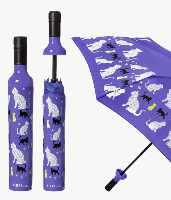 NEW! Vinrella Purrfection Bottle Umbrella: NEW! Vinrella Purrfection Bottle Umbrella Vinrella umbrellas have a no-drip design to seal your wet umbrella in the bottle and protect your purse, backpack or briefcase. Loop concealed in handle for c
