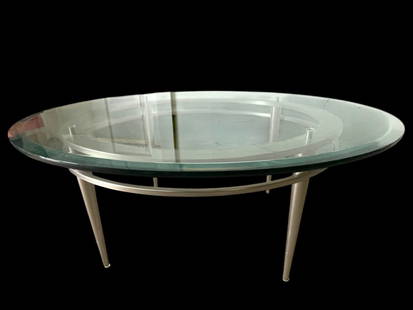 MODERN ROUND GLASS AND METAL COFFEE TABLE 38": SLEEK CONTEMPORARY COFFEE TABLE FEATURING A CIRCULAR TEMPERED GLASS TOP SUPPORTED BY A BRUSHED METAL FRAME WITH CONICAL LEGS AND A MODERN GEOMETRIC SUPPORT RING. THE CLEAN LINES AND MINIMALIST SILHOUE