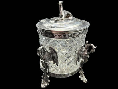 VINTAGE ORNATE CUT CRYSTAL BISCUIT BOX: ORNATE CUT CRYSTAL JAR -VERY GOOD PRE-OWNED CONDITION -APPROX 8"x8"x7" - A MAGNIFICENTLY DETAILED CUT CRYSTAL JAR WITH SILVER-PLATED MOUNTS FEATURING A GREEK KEY BORDER AND ELEGANT STORK MOTIFS. THE L