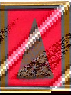 FRAMED INDONESIAN BATIK COPPER PRINTING TOOL 16": FRAMED VINTAGE INDONESIAN BATIK COPPER PRINTING TOOL – A STRIKING EXAMPLE OF TRADITIONAL TEXTILE ARTISTRY, THIS TRIANGULAR COPPER TOOL WAS USED IN THE ANCIENT PROCESS OF BATIK WAX RESIST FABRIC PRIN