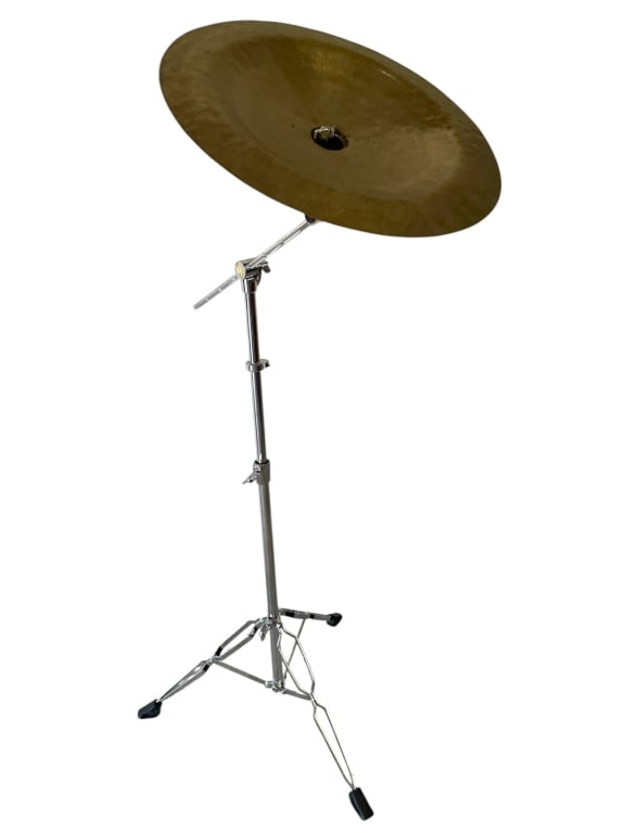 20" CYMBAL WITH BOOM STAND: 20" CYMBAL WITH BOOM STAND. FEATURES TRADITIONAL HAND-HAMMERED DESIGN WITH DISTINCTIVE TRASHY SOUND, DARK PATINA, AND STURDY TRIPOD STAND SUITABLE FOR DRUM KITS OR LIVE PERFORMANCE SETUPS. VERY GOOD P
