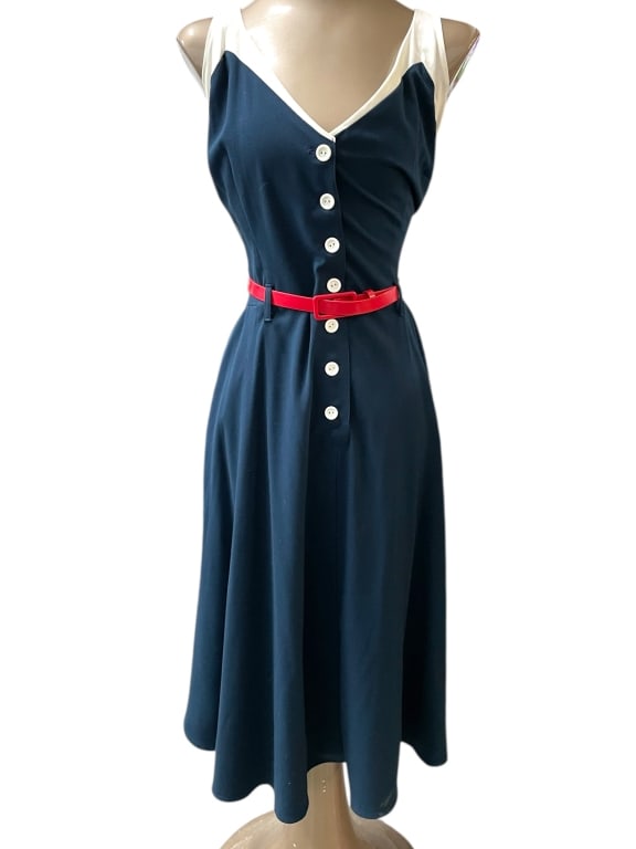 RETRO NAVY BLUE BUTTON-DOWN DRESS WITH RED BELT: TATYANA RETRO NAVY BLUE BUTTON-DOWN DRESS WITH RED BELT AND WHITE TRIM -VERY GOOD PRE OWNED CONDITION -NO SIZE INDICATED ON TAG (LIKELY SIZE XL) -STYLISH AND PLAYFUL NAVY BLUE SLEEVELESS DRESS FEATURI