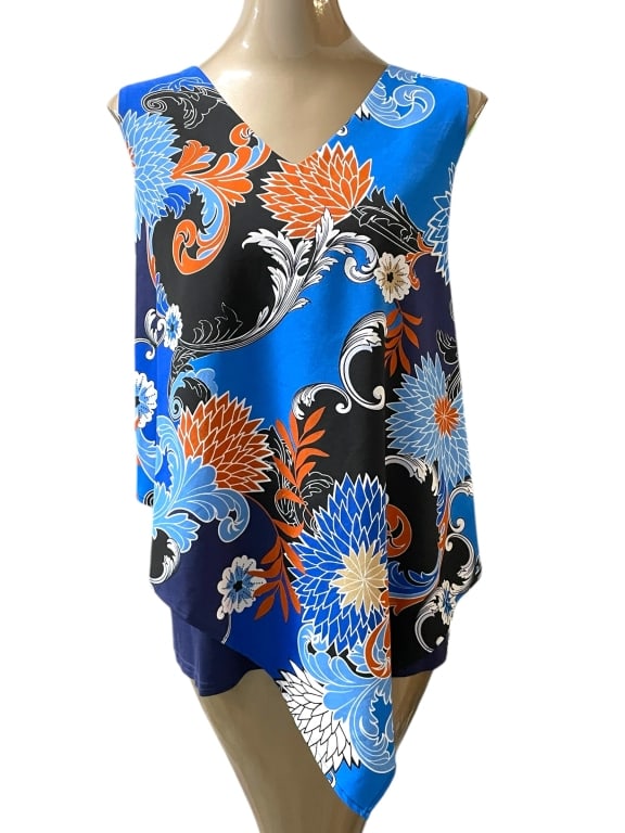 FLORAL PRINT ASYMMETRICAL SLEEVELESS BLOUSE: MULTICOLOR FLORAL PRINT ASYMMETRICAL SLEEVELESS BLOUSE -VERY GOOD PRE OWNED CONDITION -SIZE XL -EYE-CATCHING AND MODERN, THIS SLEEVELESS BLOUSE FEATURES A DRAMATIC ASYMMETRICAL HEMLINE AND VIBRANT FLO