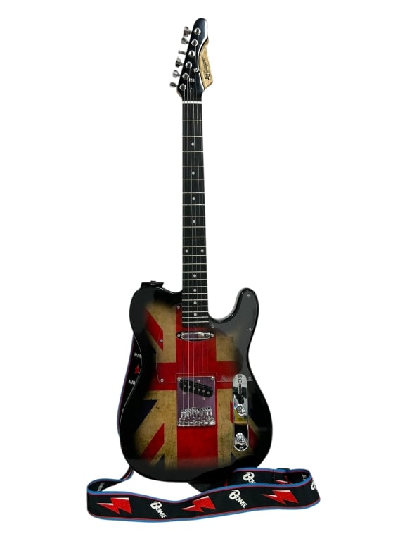 LEO JAYMZ TY STYLE UNION JACK ELECTRIC GUITAR: LEO JAYMZ TY STYLE UNION JACK ELECTRIC GUITAR -VERY GOOD PRE-OWNED CONDITION -APPROX 40" -THIS STRIKING LEO JAYMZ ELECTRIC GUITAR FEATURES A BOLD UNION JACK DESIGN ON A CLASSIC TY-STYLE BODY, COMBININ