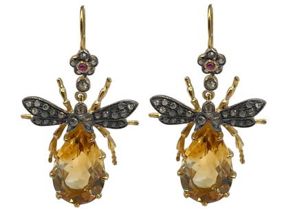 9K GOLD AND SILVER INSECT DROP EARRINGS 7.83G: 9K GOLD AND SILVER INSECT DROP EARRINGS FEATURING PEAR-SHAPED CITRINE BODIES 7.83G_x005F -VERY GOOD PRE OWNED CONDITION_x005F -ROSE CUT DIAMONDS 46 PCS APPROX: 0.55 CTS_x005F -RUBY 2 PCS APPROX: 0.15