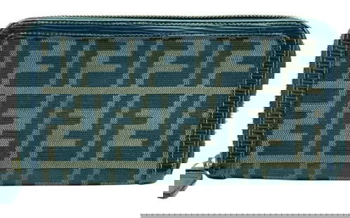 FENDI ZUCCA MONOGRAM ZIP-AROUND WALLET 7": FENDI ZUCCA MONOGRAM ZIP-AROUND WALLET 7" -PRE OWNED CONDITION, ZIPPER DOES NOT FUNCTION PROPERLY TO CLOSE -APPROX 7" X 4" -FEATURES ICONIC DOUBLE “F&rdquo; LOGO PATTERN, INTERIOR CARD SLOTS, COIN P