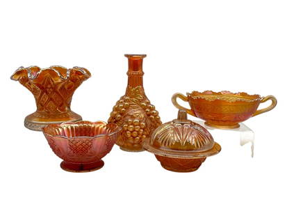 COLLECTION OF 5 CARNIVAL GLASS PIECES: COLLECTION OF 5 CARNIVAL GLASS PIECES -VERY GOOD PRE OWNED CONDITION -5 PIECES -SEE PHOTOS FOR SIZES -BEAUTIFUL AMBER IRIDESCENT GLASS INCLUDES A SCALLOPED RIM VASE, GRAPE CLUSTER PATTERN DECANTER, HA