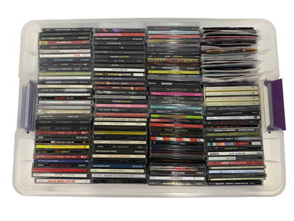 COLLECTION OF 130+ CDS: COLLECTION OF 130+ CDS -CONDITIONS VARY -MASSIVE COLLECTION OF 130+ CDS SPANNING ROCK, METAL, RAP, PUNK, AND ALTERNATIVE GENRES. HOUSED IN A LARGE PLASTIC BIN WITH LID, THIS DIVERSE LOT FEATURES MAJOR