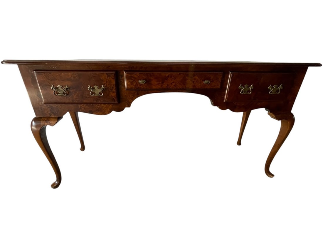 QUEEN ANNE-STYLE MAHOGANY SIDEBOARD 60": QUEEN ANNE-STYLE MAHOGANY SIDEBOARD -A BEAUTIFULLY CRAFTED MAHOGANY SIDEBOARD IN THE QUEEN ANNE STYLE, FEATURING A GRACEFULLY CURVED APRON, CABRIOLE LEGS, AND ELEGANT BRASS HARDWARE. THE RICH WOOD GRA