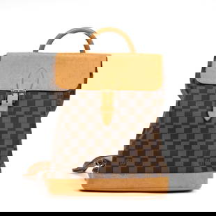 LOUIS VUITTON LTD. ED. CENTENAIRE BACKPACK: LOUIS VUITTON LTD. ED. CENTENAIRE BACKPACK ARLEQUIN SOHO DAMIER EBENEExtremely rare Louis Vuitton Centenaire Backpack Arlequin Soho in Damier Ebene coated canvas with vachetta leather trim and golden