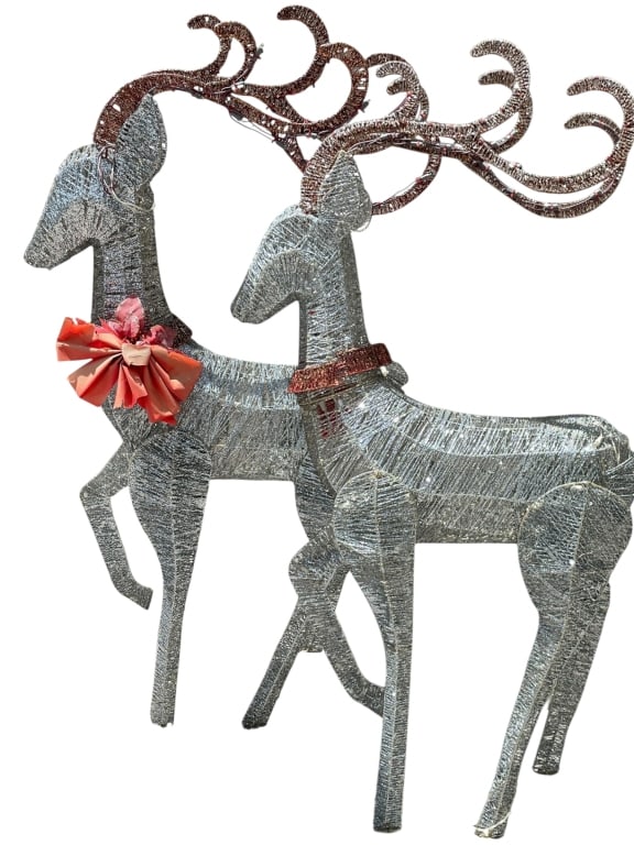 PAIR OF SPARKLING OUTDOOR HOLIDAY REINDEER 56": PAIR OF SPARKLING ILLUMINATED OUTDOOR HOLIDAY REINDEER – FESTIVE PAIR OF STANDING REINDEER SCULPTURES DESIGNED FOR OUTDOOR DISPLAY, FEATURING A GLITTERING SILVER WRAPPED FINISH WITH SWIRLED ANTLERS 