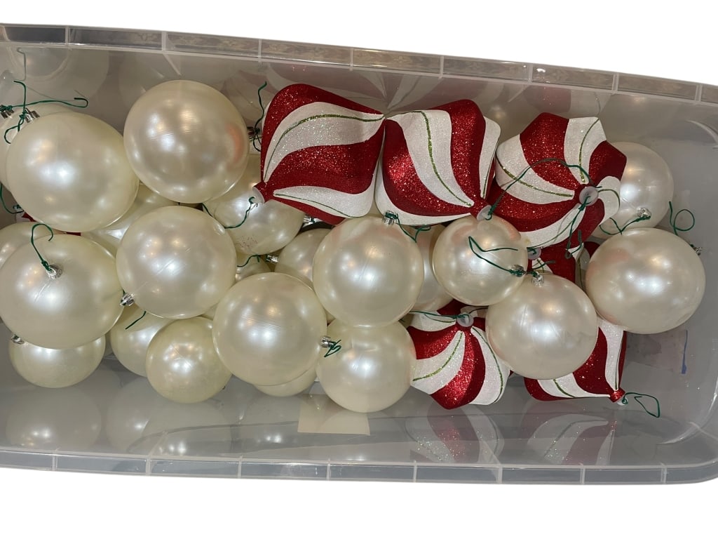 OVERSIZED HOLIDAY ORNAMENTS PEARL & PEPPERMINT: LARGE LOT OF OVERSIZED HOLIDAY ORNAMENTS FEATURING 30+ CREAM PEARLESCENT BALLS APPROXIMATELY 4.5" IN DIAMETER ALONGSIDE 10 PEPPERMINT-SWIRLED RED, WHITE, AND GREEN GLITTERED DROP ORNAMENTS MEASURING A