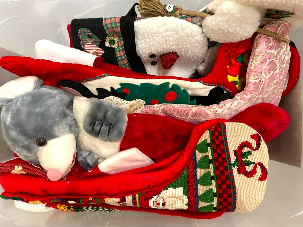 LOT OF 10+ VINTAGE CHRISTMAS STOCKINGS: LOT OF 10+ VINTAGE CHRISTMAS STOCKINGS -VARYING CONDITIONS, SEE PHOTOS -THIS WHIMSICAL COLLECTION INCLUDES AN ASSORTMENT OF FESTIVE STOCKINGS FEATURING PLUSH CHARACTERS, NEEDLEPOINT DESIGNS, LACE TRIM