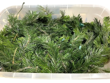 BIN FILLED WITH ARTIFICIAL PINE CHRISTMAS GARLAND