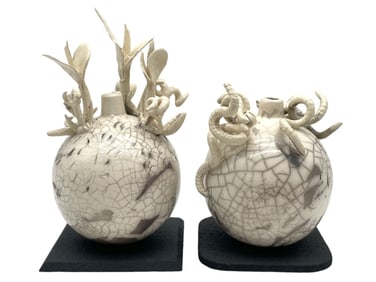 PAIR OF CRACKLE SPHERE FIGURINES 7.5"