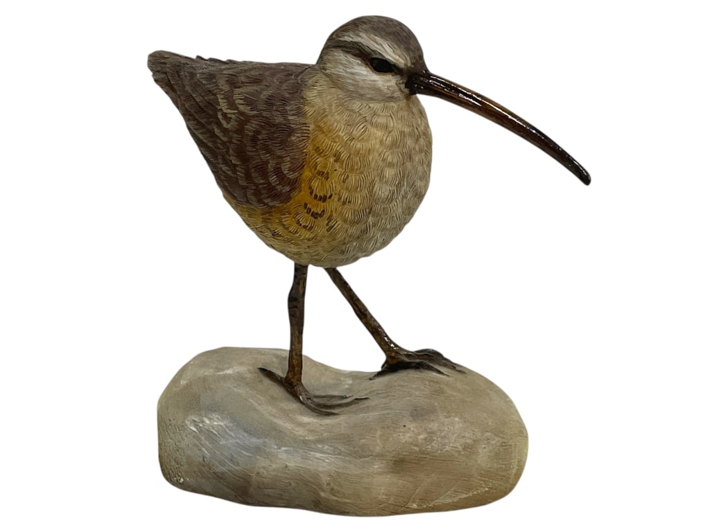 CARVED AND PAINTED WOODEN SHOREBIRD FIGURINE 7": CARVED AND PAINTED WOODEN SHOREBIRD FIGURINE 7" -VERY GOOD PRE OWNED CONDITION -APPROX 7" X 7" -THIS DETAILED CARVING FEATURES A LONG-BILLED BIRD WITH REALISTIC FEATHER DETAIL IN BROWN, TAN, AND GOLDE