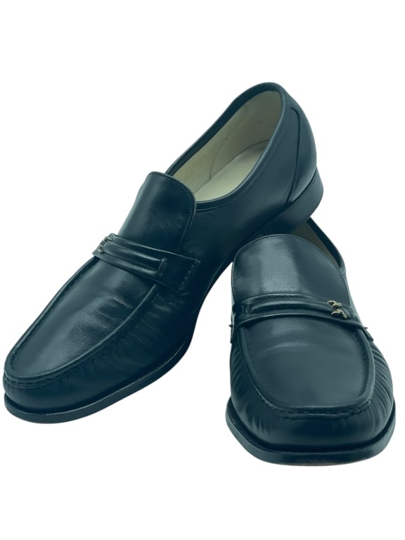 FLORESHEIM ROYAL IMPERIAL BLACK LEATHER LOAFERS 12: FLORESHEIM THE ROYAL IMPERIAL BLACK LEATHER LOAFERS, SIZE 12 D. THESE CLASSIC SLIP-ON SHOES FEATURE POLISHED BLACK LEATHER UPPERS WITH A DISTINCTIVE VAMP STRAP DETAIL, PADDED LEATHER INSOLES, AND LEAT