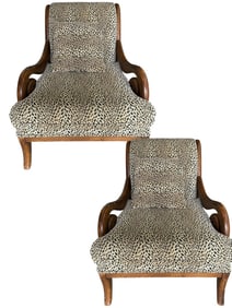 PAIR OF CARVED WOOD ARM CHAIRS WITH LEOPARD PRINT