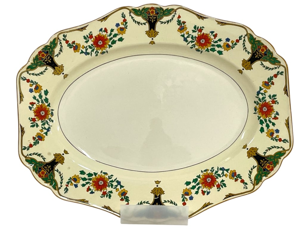 JOHN MADDOCK & SONS MINERVA SERVING TRAY 16": JOHN MADDOCK & SONS MINERVA SERVING TRAY 16" -GOOD PRE OWNED CONDITION, SOME SCRATCHES (SEE PHOTOS) -APPROX 16" X 13" -FEATURES A COLORFUL BOUQUET AND CORNUCOPIA MOTIF AROUND THE BORDER WITH GOLD ACCE