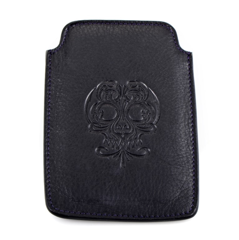 STEPHEN WEBSTER BLACK LEATHER SKULLIPHONE CASE: STEPHEN WEBSTER BLACK CALFSKIN LEATHER SKULL ENGRAVED IPHONE CASE -Understated yet undeniably Rock 'n Roll, this decorative skull engraved black leather iPhone case is a stylish phone protector proudl