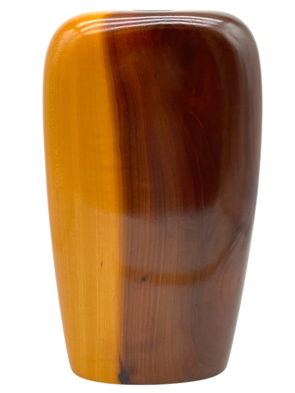 CONTEMPORARY WOOD VASE WITH HIGH GLOSS FINISH 16": CONTEMPORARY WOOD VASE WITH HIGH GLOSS FINISH 16" -VERY GOOD PRE OWNED CONDITION -APPROX 16"H X 9"W X 3"D -FEATURES A BEAUTIFUL CONTRAST OF LIGHT AND DARK WOODS, SHOWCASING NATURAL BURL FIGURING AND O