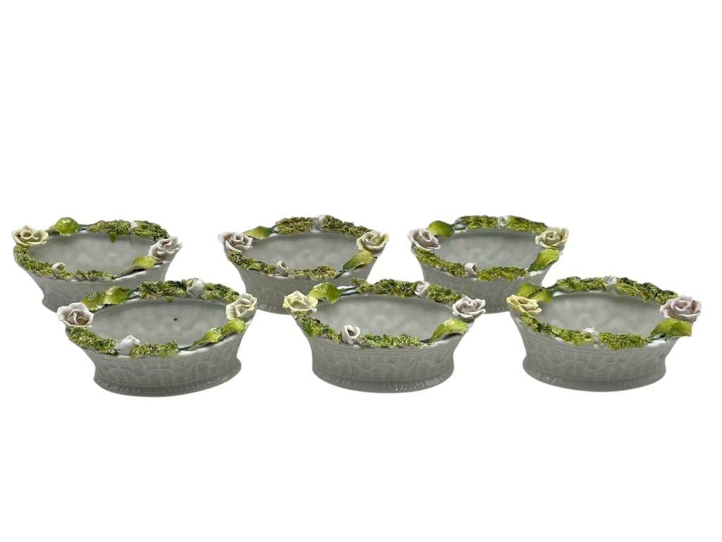 SIX VINTAGE CAPODIMONTE STYLE PORCELAIN OPEN SALTS: SIX VINTAGE CAPODIMONTE STYLE PORCELAIN OPEN SALTS_x005F -VERY GOOD PRE OWNED CONDITION_x005F -SET OF 6_x005F -APPROX 1"H X 3"W_x005F -EACH FEATURES A WHITE WOVEN BASKET FORM WITH HANDCRAFTED FLORAL A