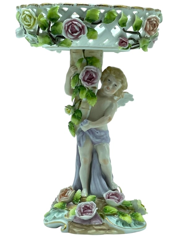 CAPODIMONTE STYLE CHERUB COMPOTE 8": HAND-PAINTED CAPODIMONTE STYLE CHERUB COMPOTE WITH FLORAL ACCENTS — A GORGEOUS HAND-PAINTED PORCELAIN COMPOTE FEATURING A DELICATE CHERUB FIGURE CLINGING TO A TREE TRUNK, SURROUNDED BY INTRICATELY A