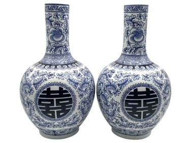 PAIR OF BLUE AND WHITE PORCELAIN LONG-NECK VASES