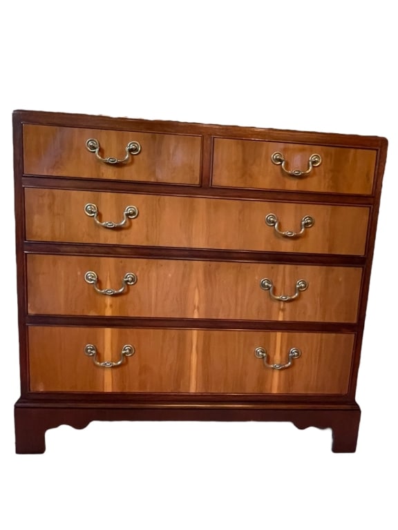 BAKER FURNITURE BURLWOOD CHEST OF DRAWERS: This is a beautiful vintage chest of drawers by the highly regarded American furniture maker Baker Furniture. The piece is crafted in the classic Federalist or Sheraton style, featuring a dark wood fr