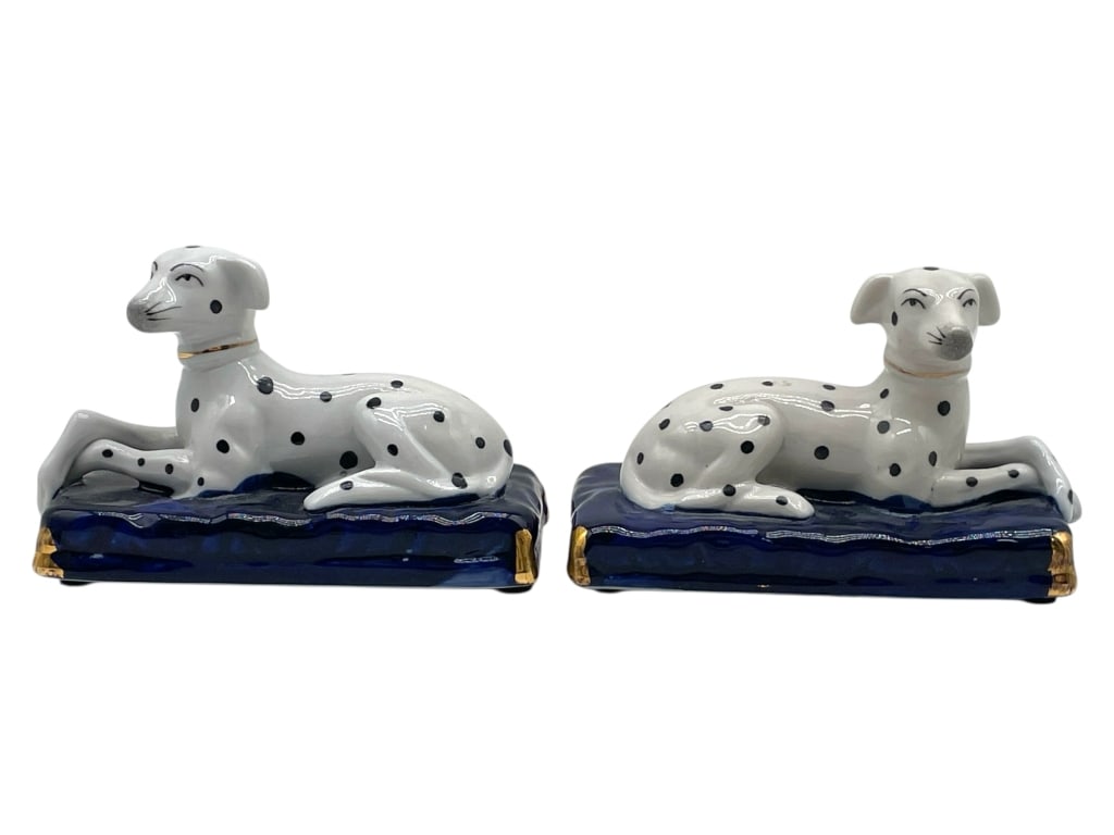 STAFFORDSHIRE STYLE PORCELAIN DALMATIAN FIGURINES: STAFFORDSHIRE STYLE PORCELAIN DALMATIAN DOG FIGURINES -Very good pre owned condition -Approx 3.5"h x 5"w -Charming pair of porcelain Dalmatian-style dog figurines, each reclining gracefully on a rich